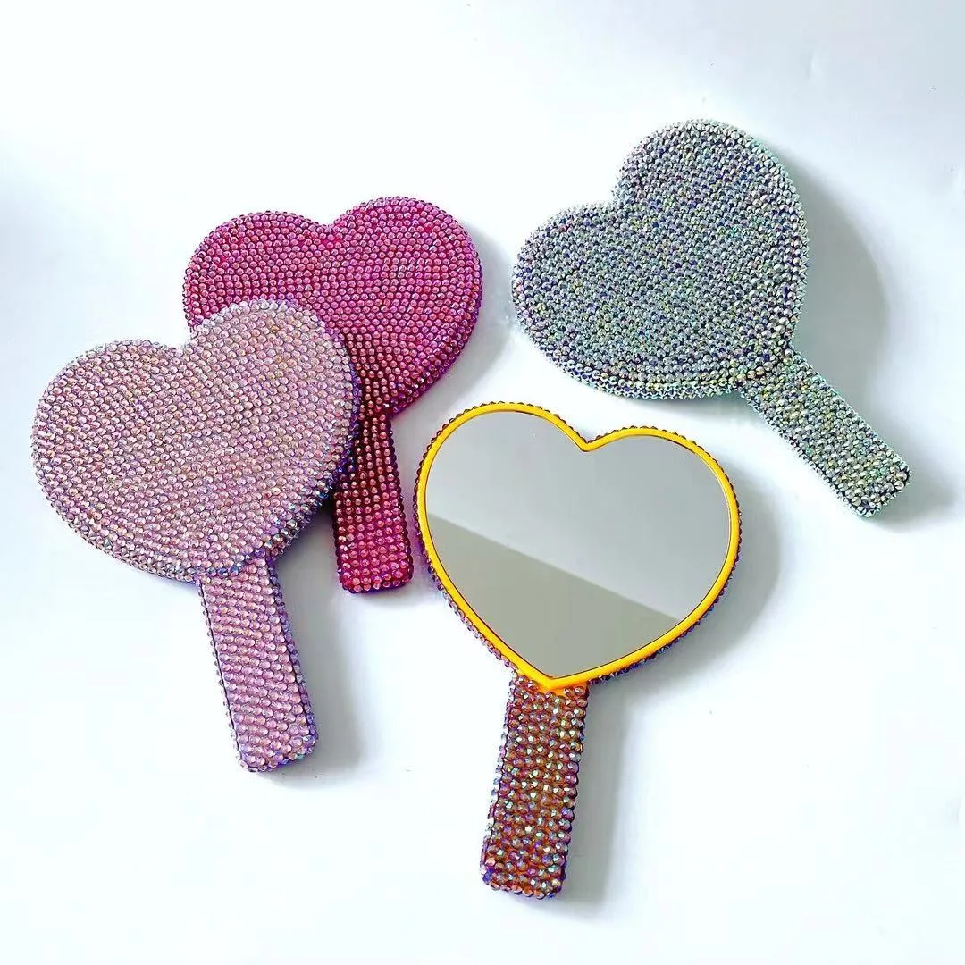 Heart-shaped rhinestone hand mirrors in custom color options