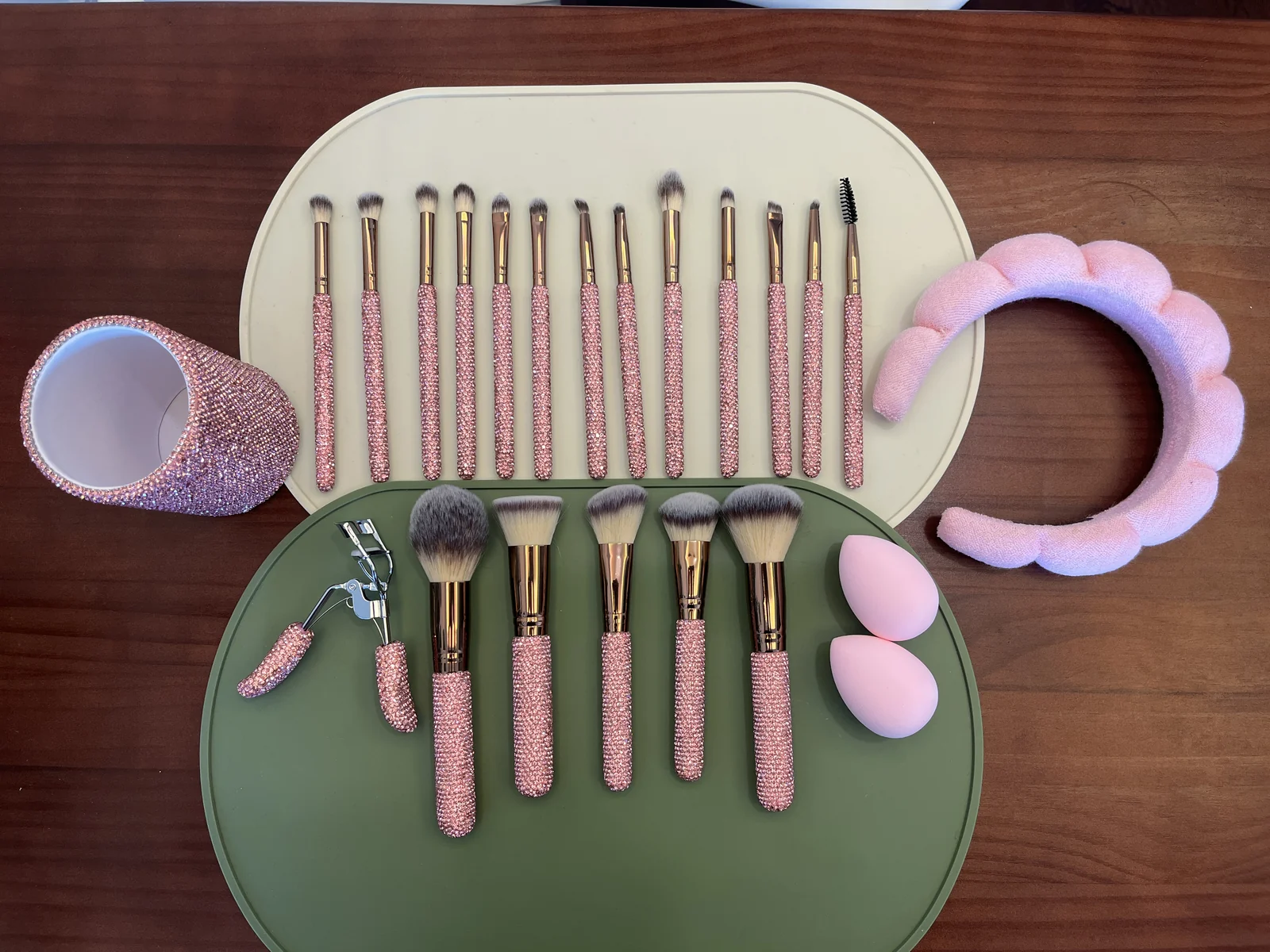 Pink rhinestone makeup brushes and matching beauty accessories