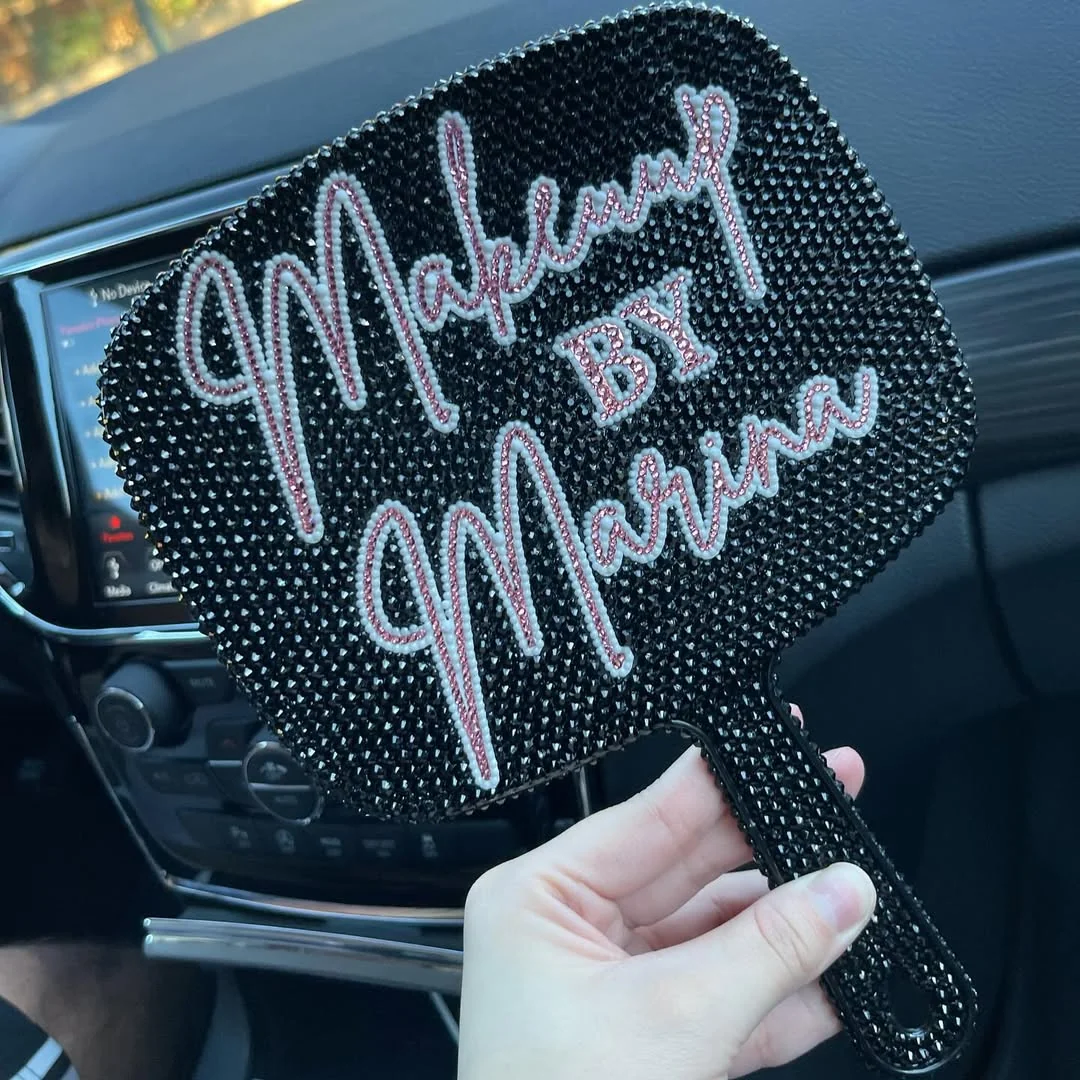 Black rectangular rhinestone hand mirror shown as a custom design example